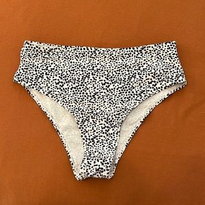 SOLD. High waisted black and white bikini bottoms. Size large. Never worn.